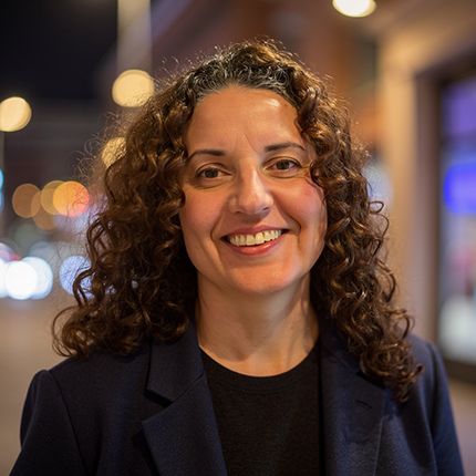 Ana Radis, occupational therapist and co-founder of OT Life, smiling